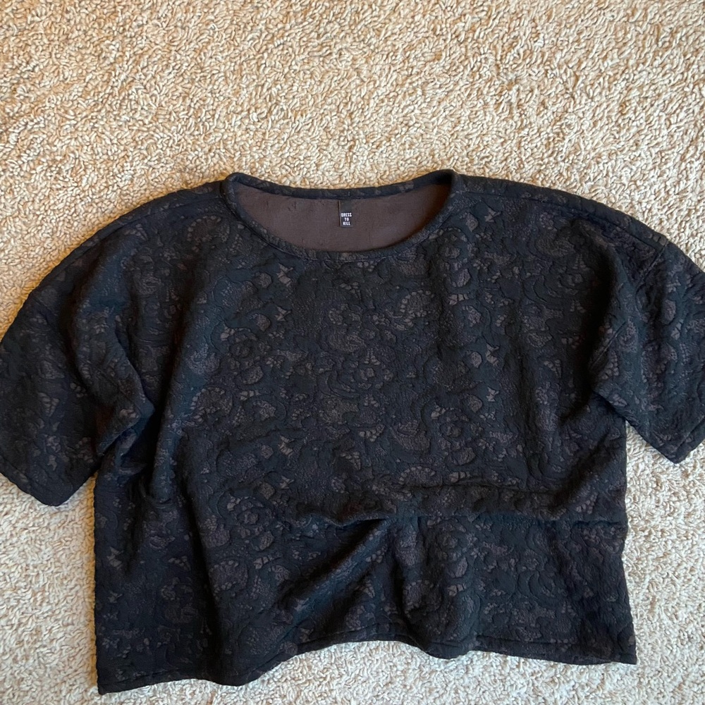 Dress to Kill black lace like design. Front pocket. One size fits all.